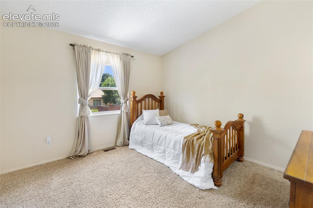 Image 15 of 33: Bedroom