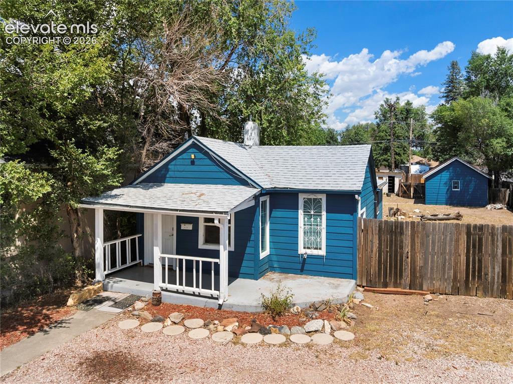 Image 2 of 48: 2 bedroom home situated on a large lot with a detached 1 car garage