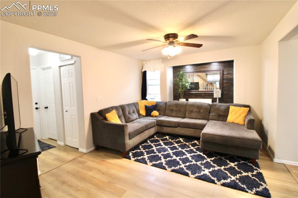 Image 11 of 50: Family room view into the living room