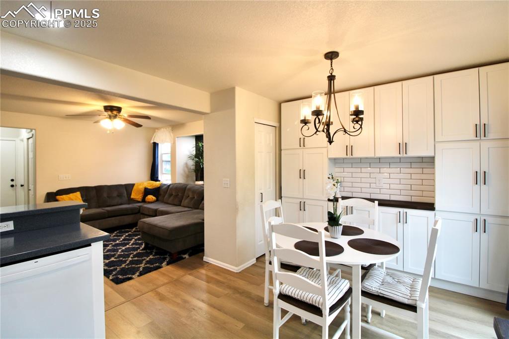 Image 12 of 50: Family room featuring an accent wall