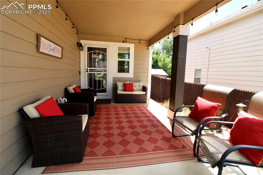 Image 3 of 50: View of patio featuring an outdoor hangout area