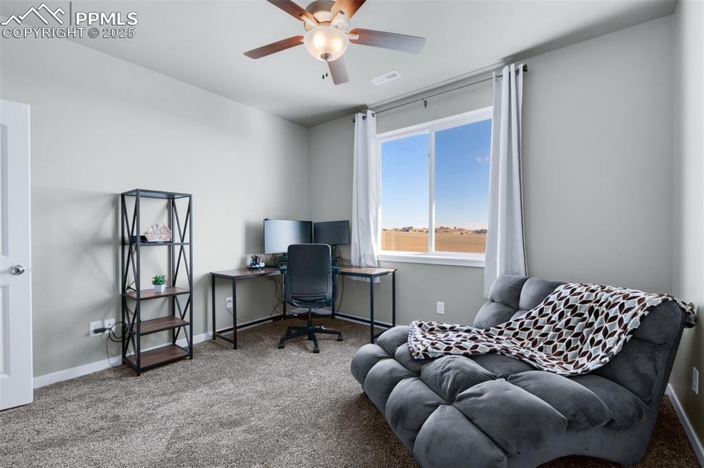 Image 33 of 50: Upper Level Bedroom