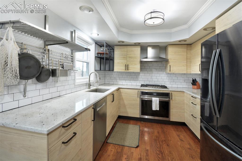 Image 4 of 32: Enjoy cooking in a chef-inspired kitchen fully remodeled in 2023, featuring