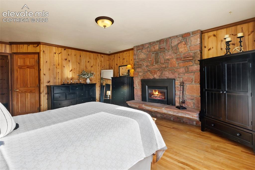 Image 16 of 43: Primary suite with gas fireplace!