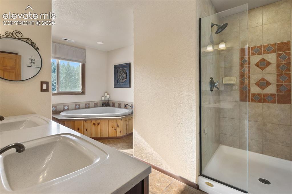 Image 20 of 43: Primary Bathroom