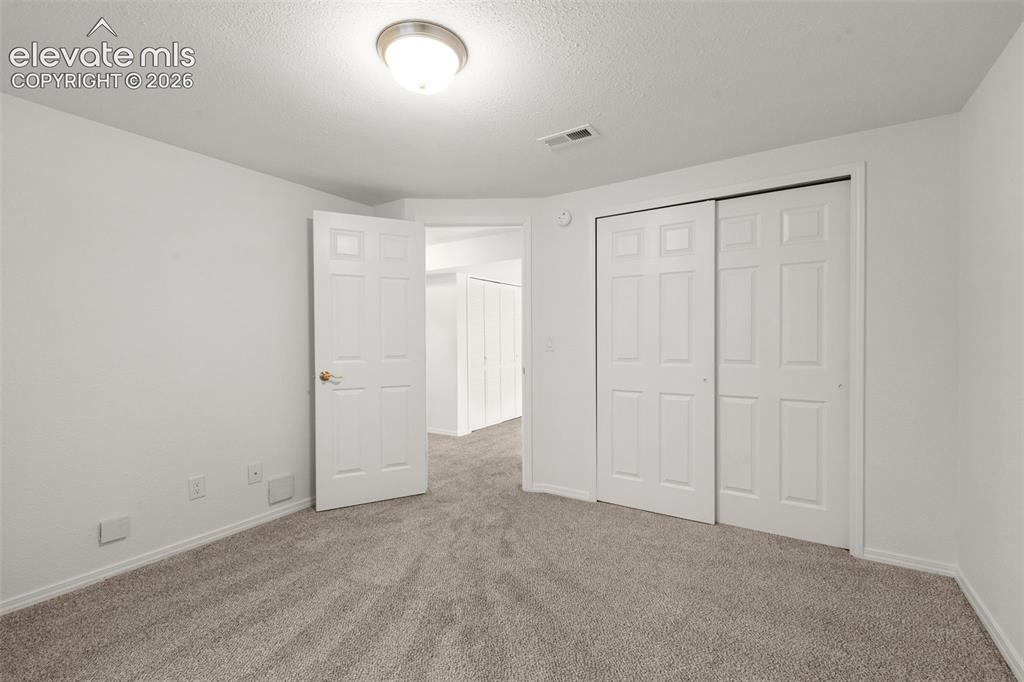 Image 27 of 36: One more look at 3rd bedroom