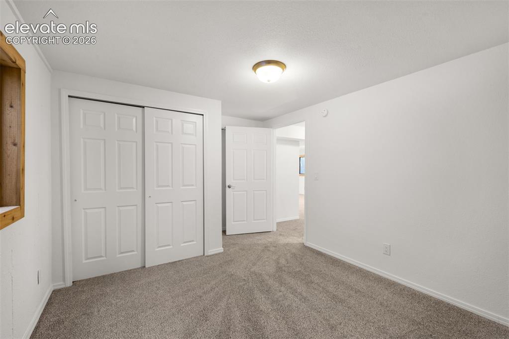 Image 30 of 36: The lower level bedrooms would be great for the kids