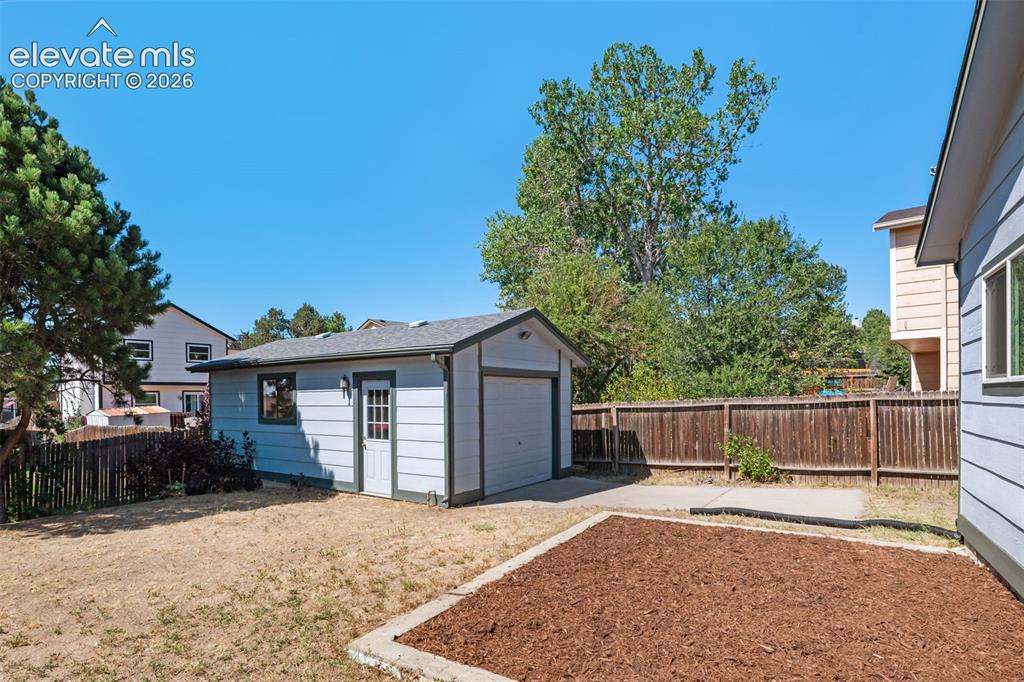 Image 34 of 36: This shed is 8 x 10. Back yard is fenced