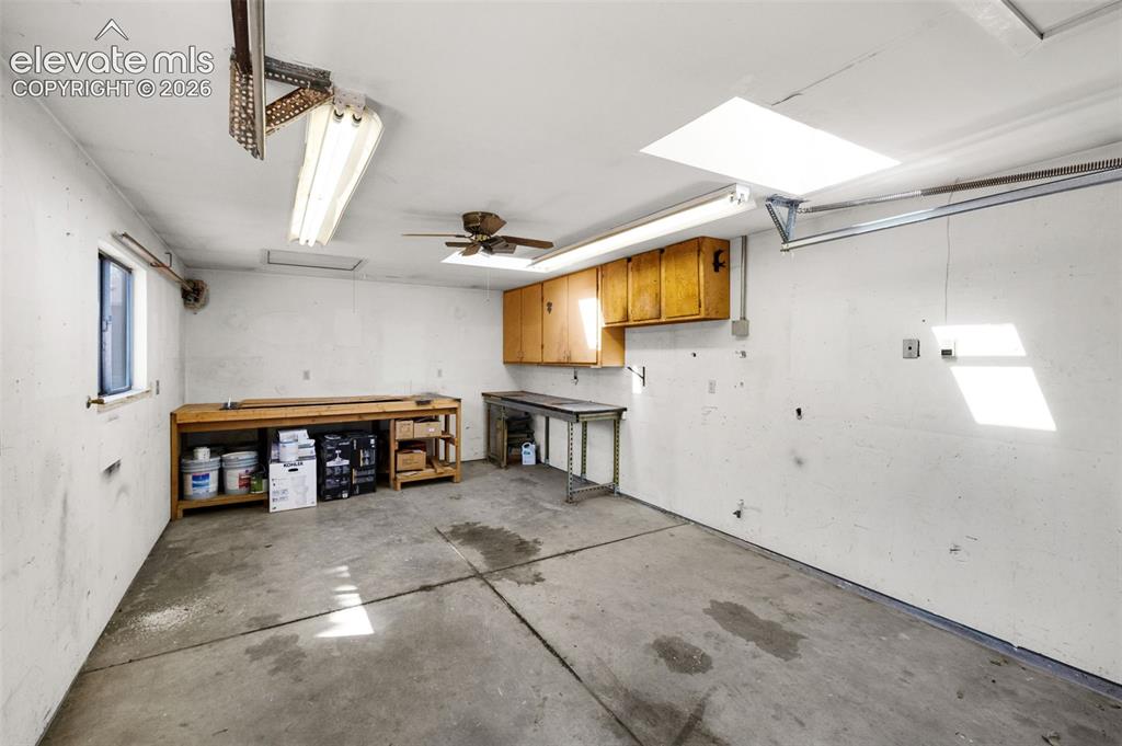 Image 35 of 36: Interior of this 2 car garage has been painted