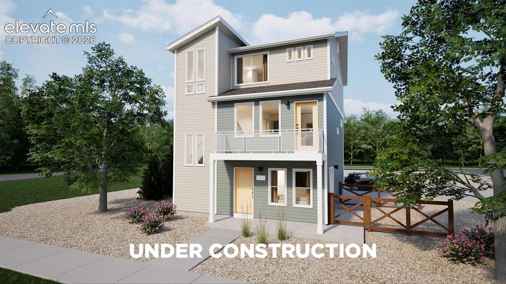 Image 1 of 31: Modern multi-story home featuring light-colored siding, a second-story balc