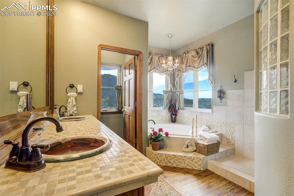 Image 16 of 40: 5 pc Master bath with soaking tub, double vanity, large walk-in shower, and