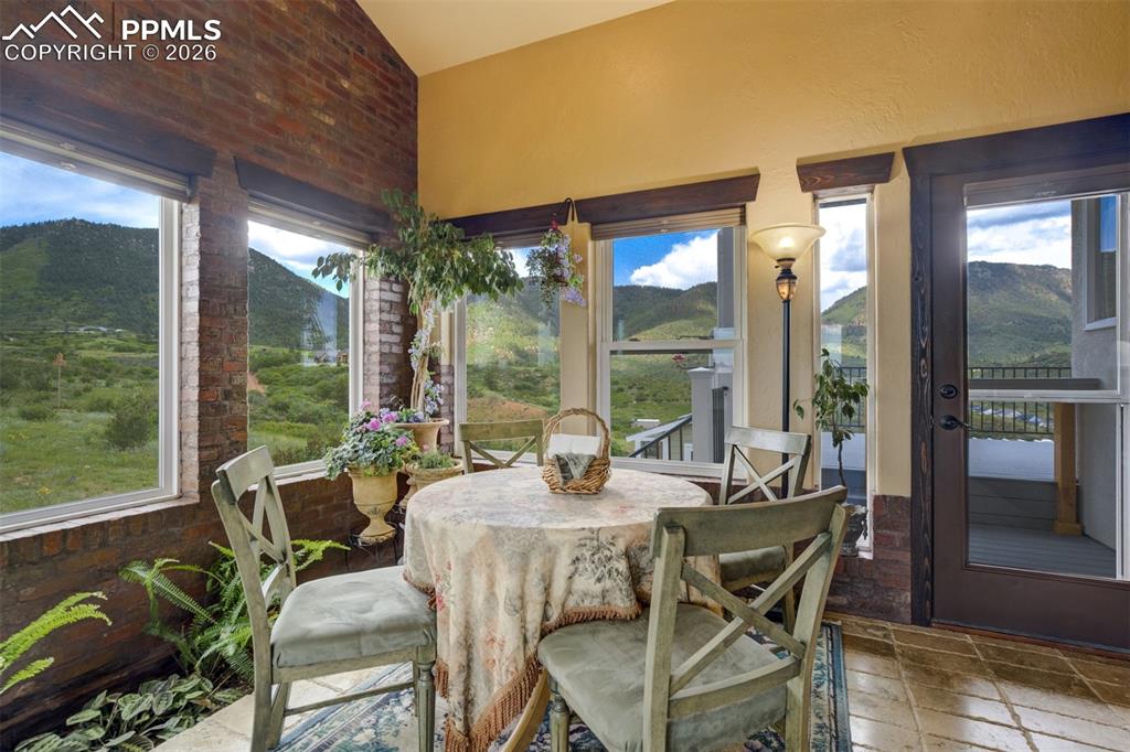 Image 29 of 40: The best room in the house for your morning coffee and evening beverage.