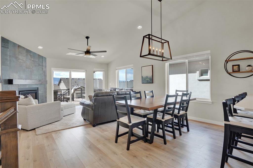 Image 12 of 42: Large open dining room right off kitchen. Great space for entertaining
