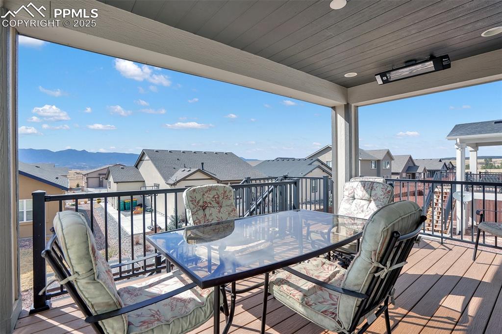 Image 37 of 42: Covered composite deck with mountain views.
