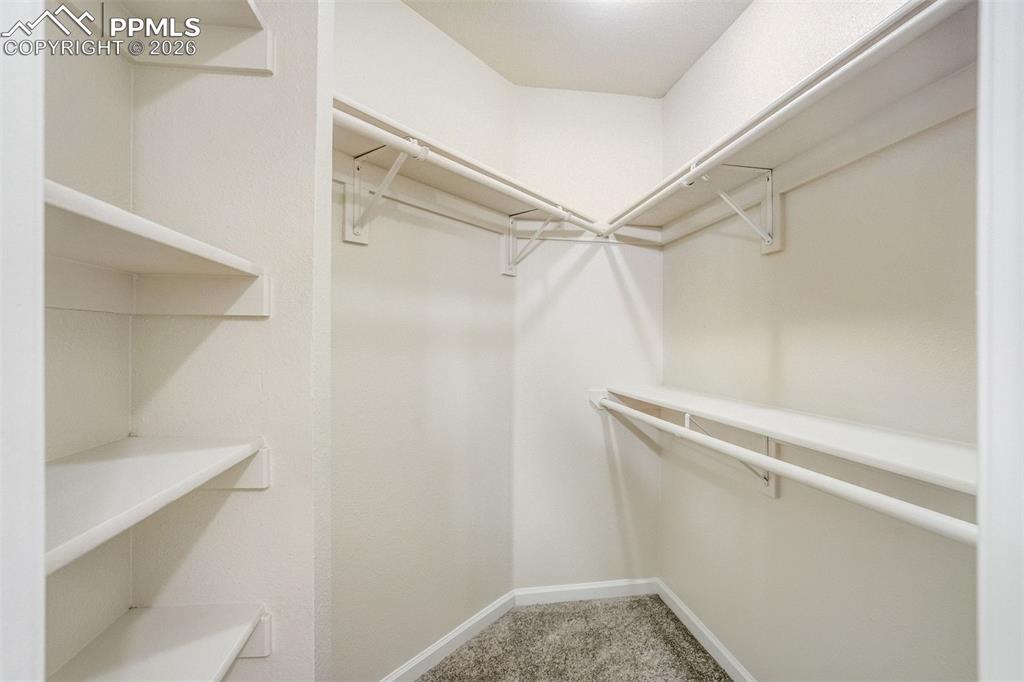 Image 24 of 43: Walk in closet