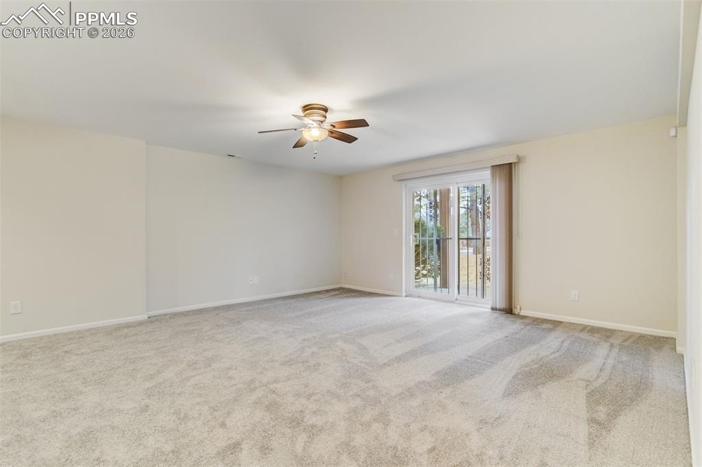 Image 27 of 43: Walk out to the beautiful manicured lawn