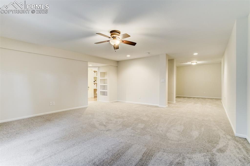 Image 28 of 43: Notice the flex space in the back which is perfect for an office or gym