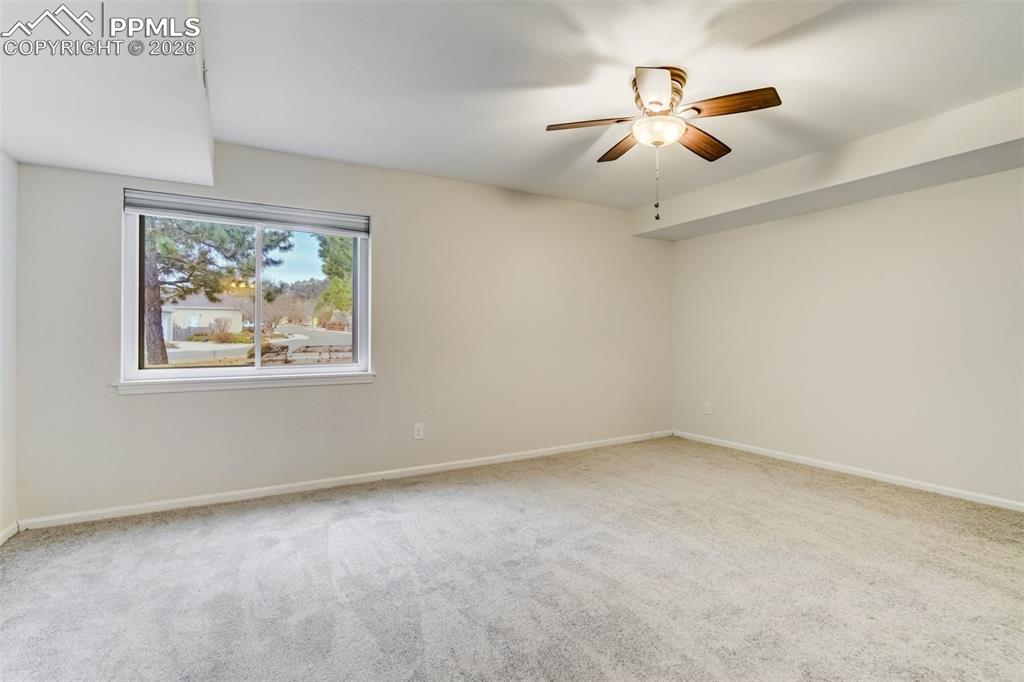 Image 29 of 43: Basement bedroom