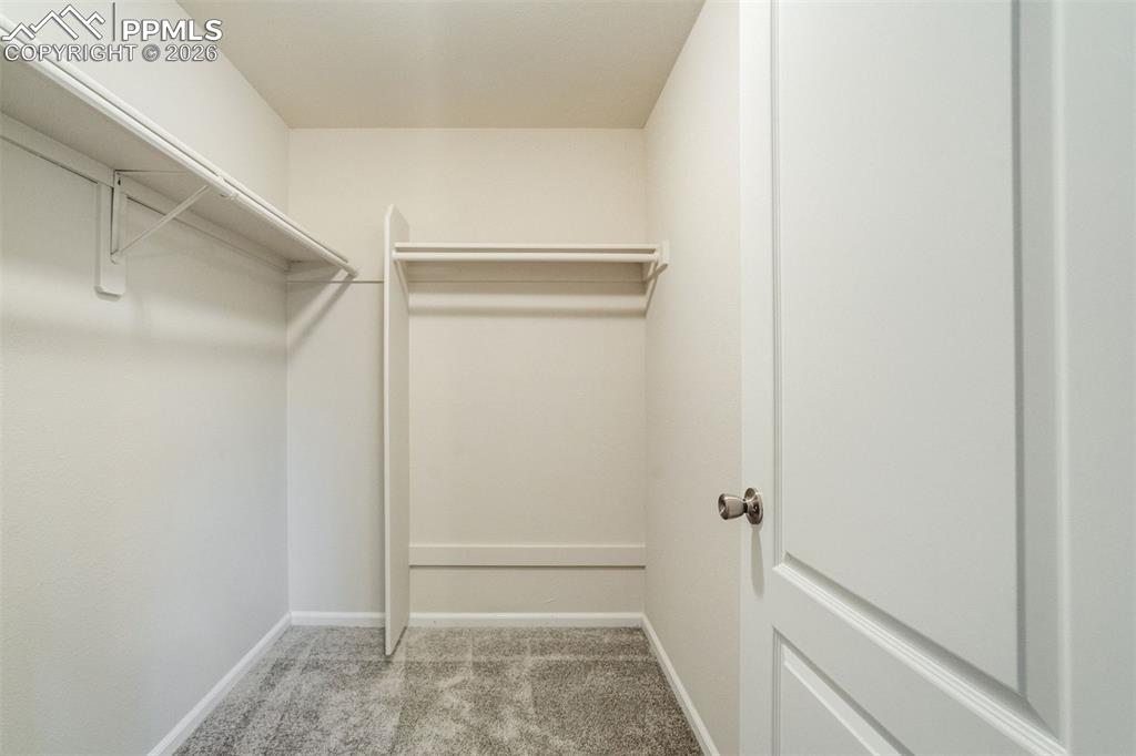 Image 32 of 43: walk in closet 