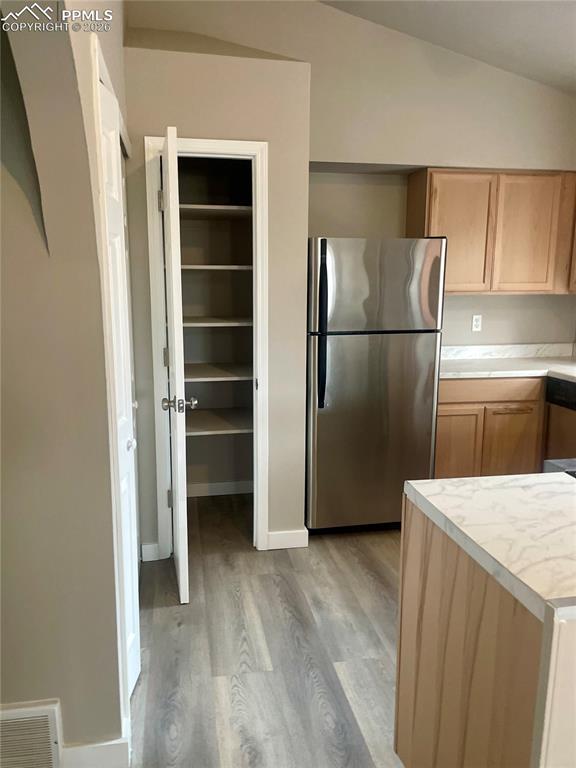 Image 25 of 43: Kitchen has Pantry.