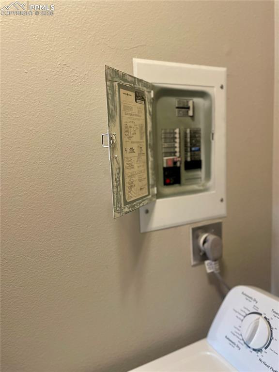 Image 26 of 43: Electric panel in Laundry/Utility area.