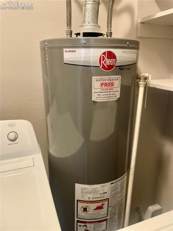 Image 27 of 43: New 40 gal. water heater with expansion tank.