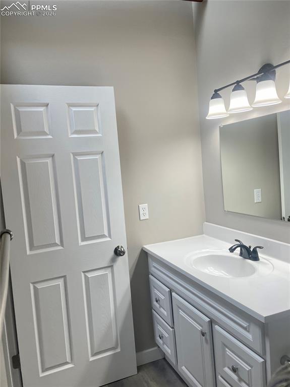 Image 32 of 43: New vanity, faucet and lights.