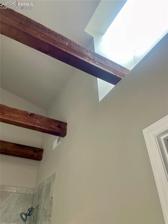 Image 34 of 43: Detailed view of bathroom ceiling and windows.
