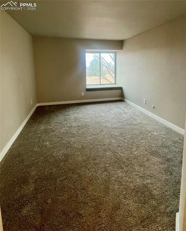 Image 38 of 43: Looking from closet area toward back of Bedroom.