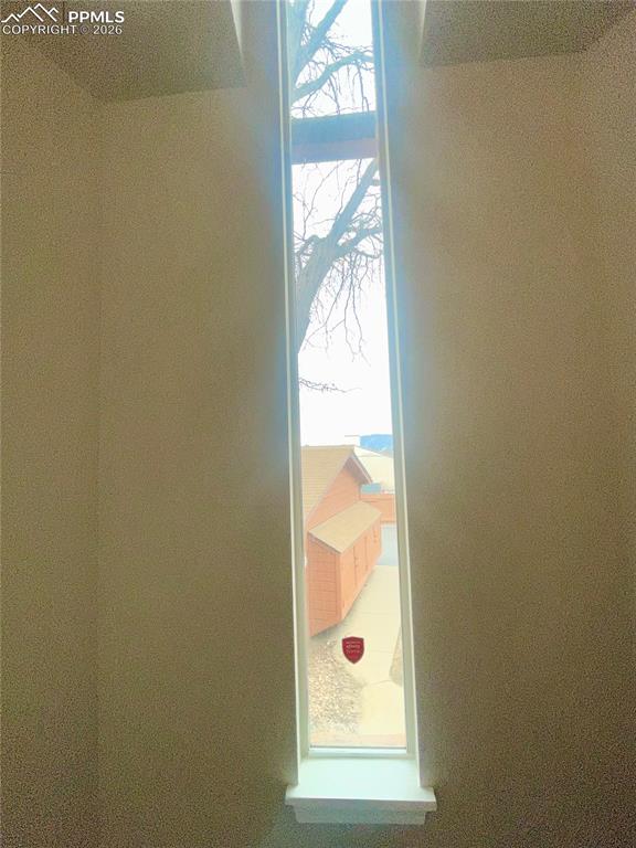 Image 6 of 43: Detailed view of tall window on landing.