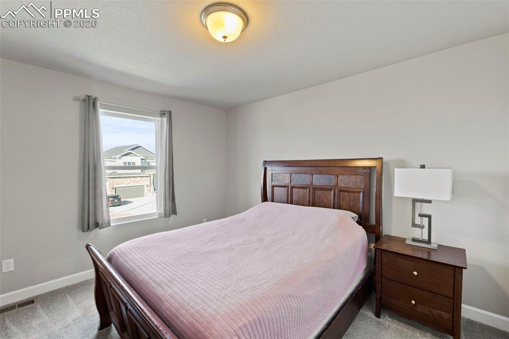 Image 16 of 39: Bedroom