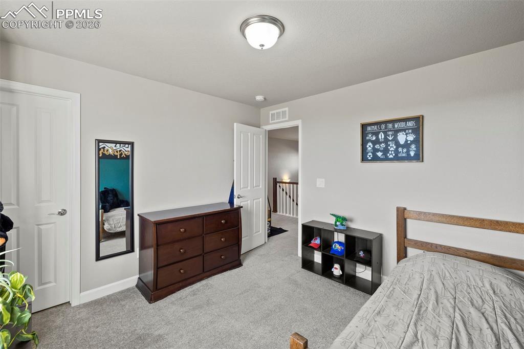 Image 20 of 39: Bedroom