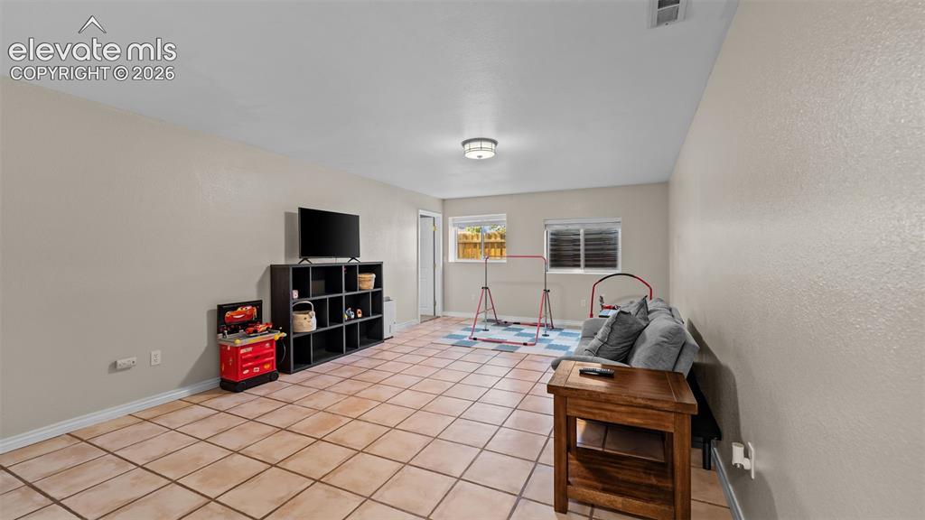 Image 10 of 30: Basement Great Room