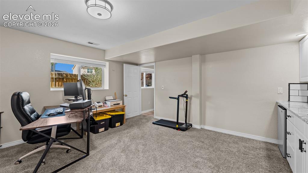Image 12 of 30: Basement Bedroom