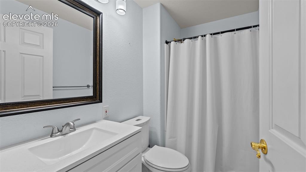 Image 14 of 30: Basement bathroom