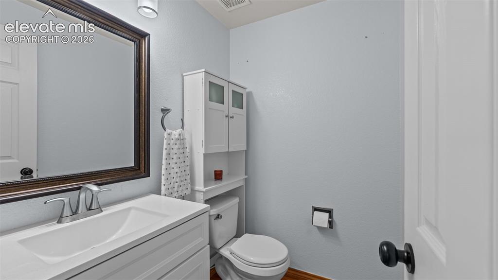 Image 9 of 30: Main level bathroom