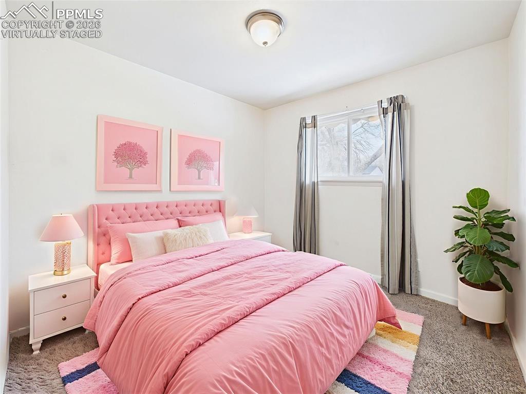 Image 24 of 50: Virtually Staged Bedroom 3 This well-proportioned bedroom includes a closet