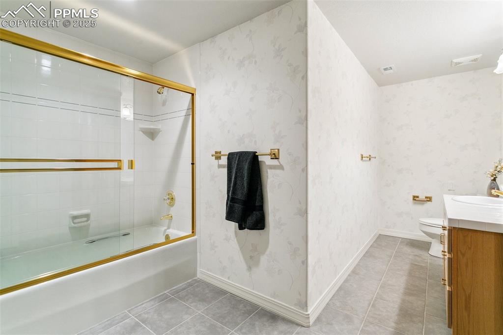 Image 43 of 50: Lower level full bath