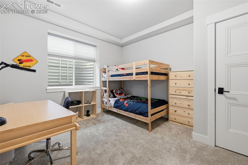 Image 28 of 38: Bedroom