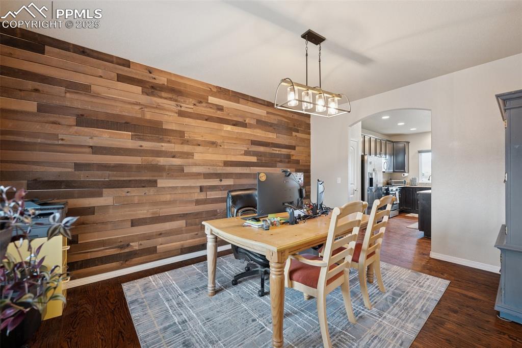Image 12 of 48: Barnwood accent wall is to die for!