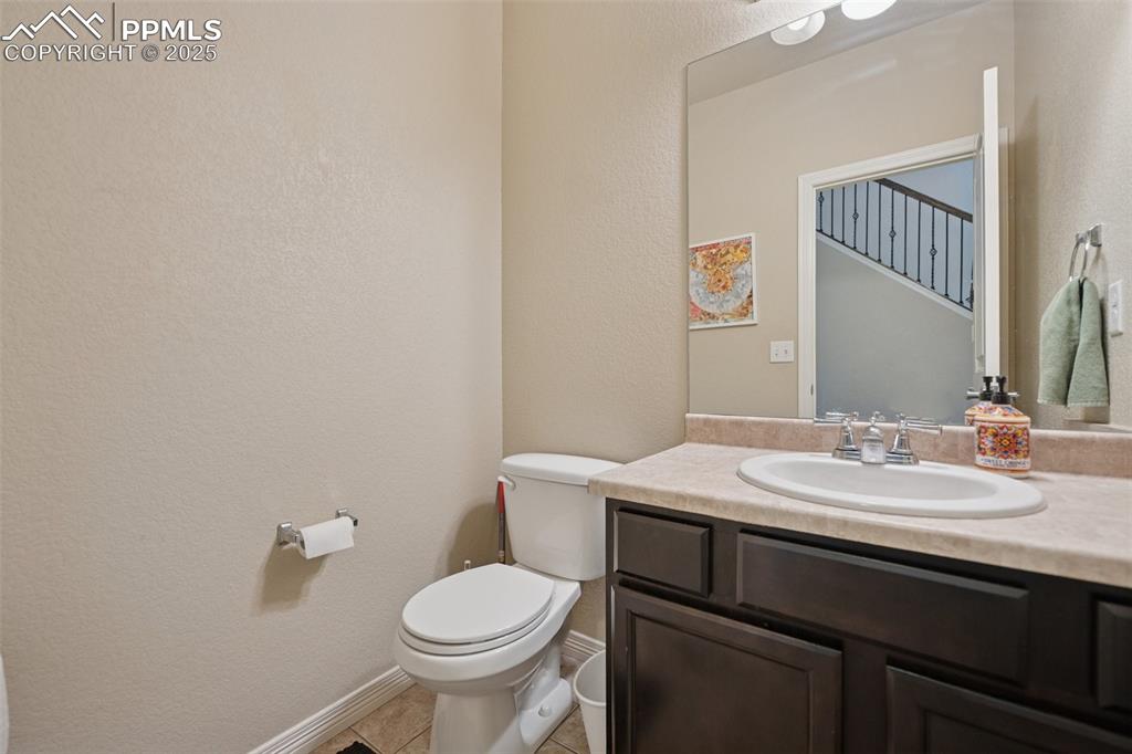 Image 13 of 48: Main level half bath!