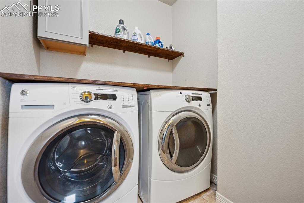 Image 19 of 48: upper level laundry is a plus!