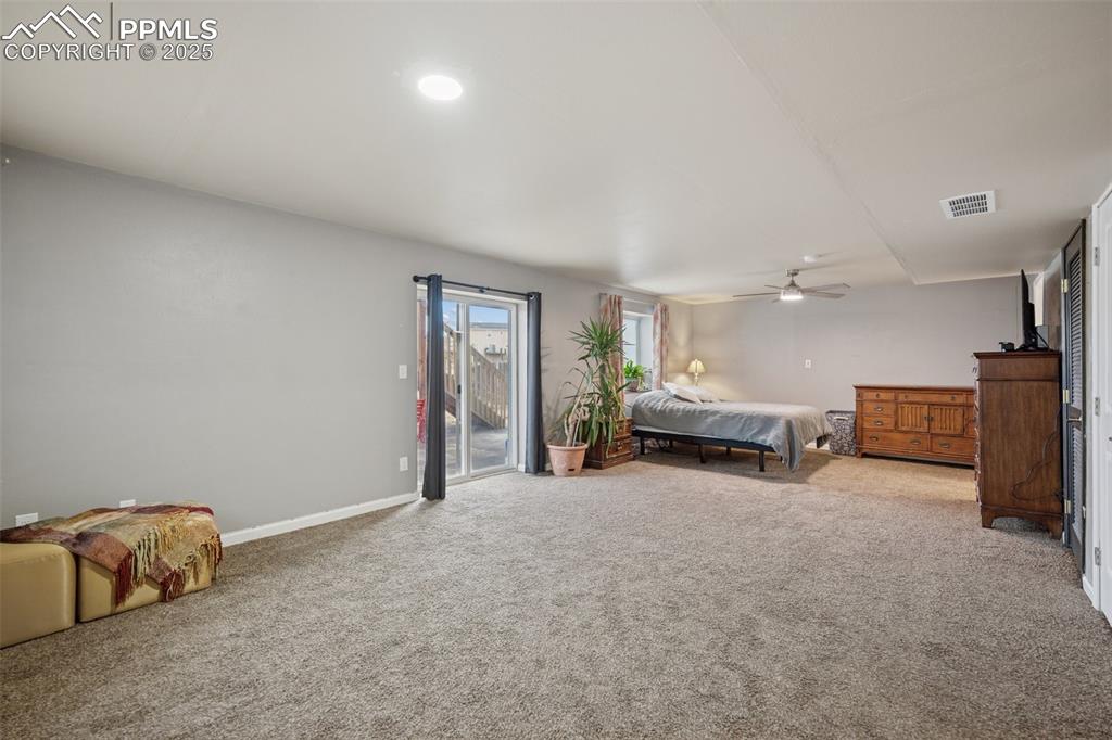 Image 29 of 48: Basement being used as a 5th bedroom!