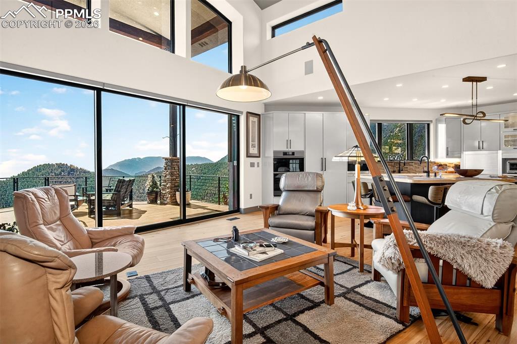 Image 12 of 50: Living room with plenty of natural light 