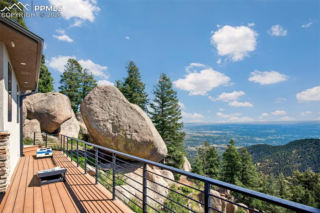 Image 20 of 50: Wrap around deck off living room with views as far as the eyes can see!