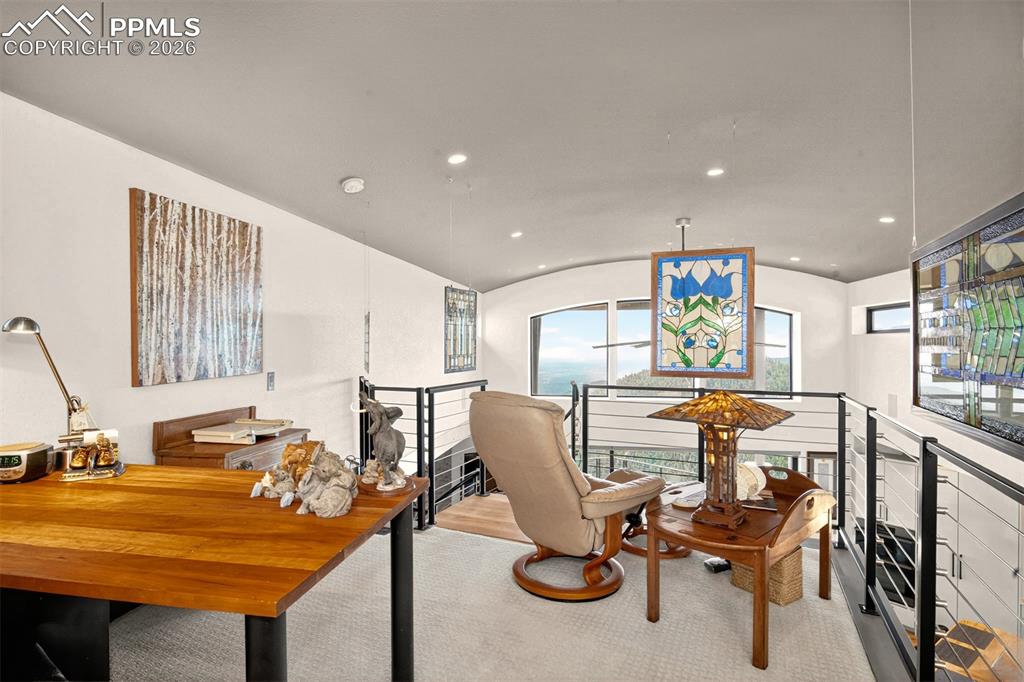 Image 22 of 50: Loft overlooking the open concept main level not to mention the mountains v