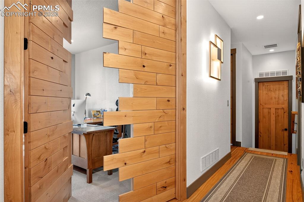 Image 36 of 50: Bedroom 4/Office with walk out to deck!