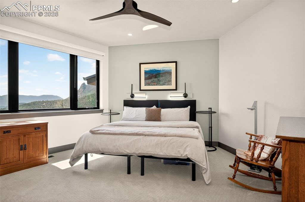 Image 39 of 50: Bedroom 2 with en suite 3/4 bathroom and walk in closet