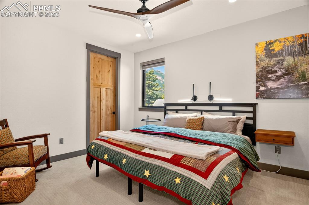 Image 42 of 50: Bedroom 3 with connecting 3/4 bathroom and walk in closet