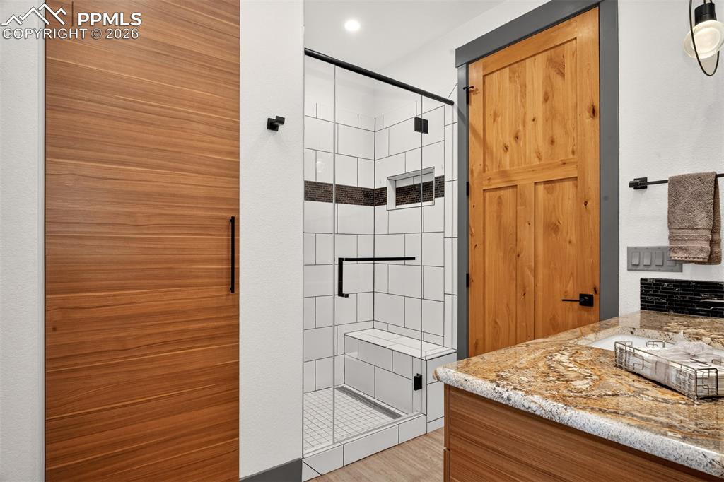 Image 44 of 50: 3/4 bathroom off bedroom 3 with access from hallway